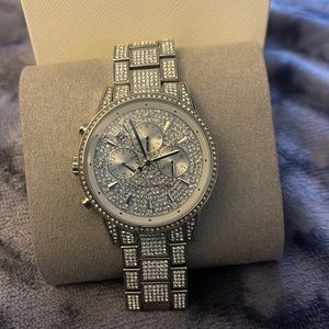 Watch is only 5 months old and has a 2 year warranty left on it.